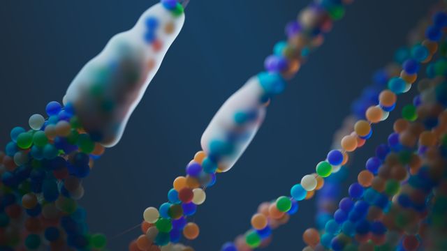 Chromosome strands in close-up, representing inherited conditions passed through a family